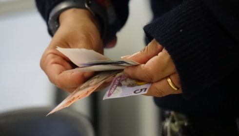 Image of fake money being counted