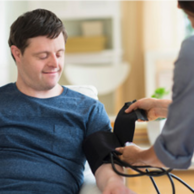 A man has his blood pressure checked