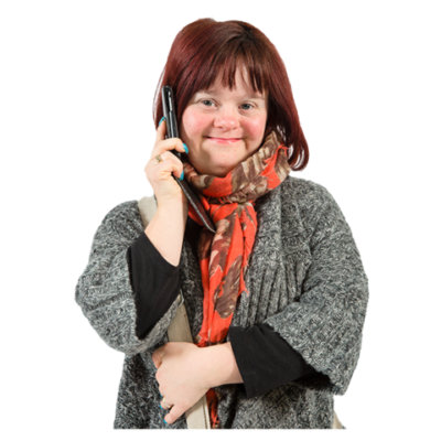 A woman talks on a telephone