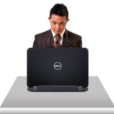 A man looks at a laptop computer