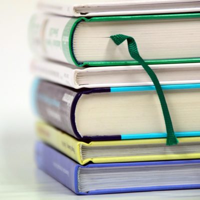 A pile of books on a table