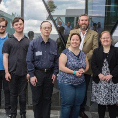 Down syndrome Advisory Network members stand together outdoors