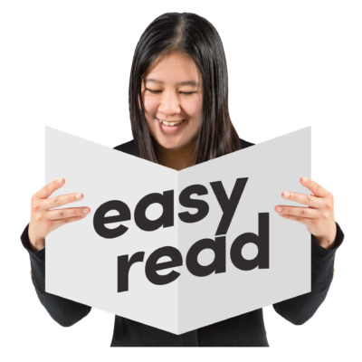 A woman holds a document with the words Easy Read