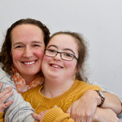 Two women smiling