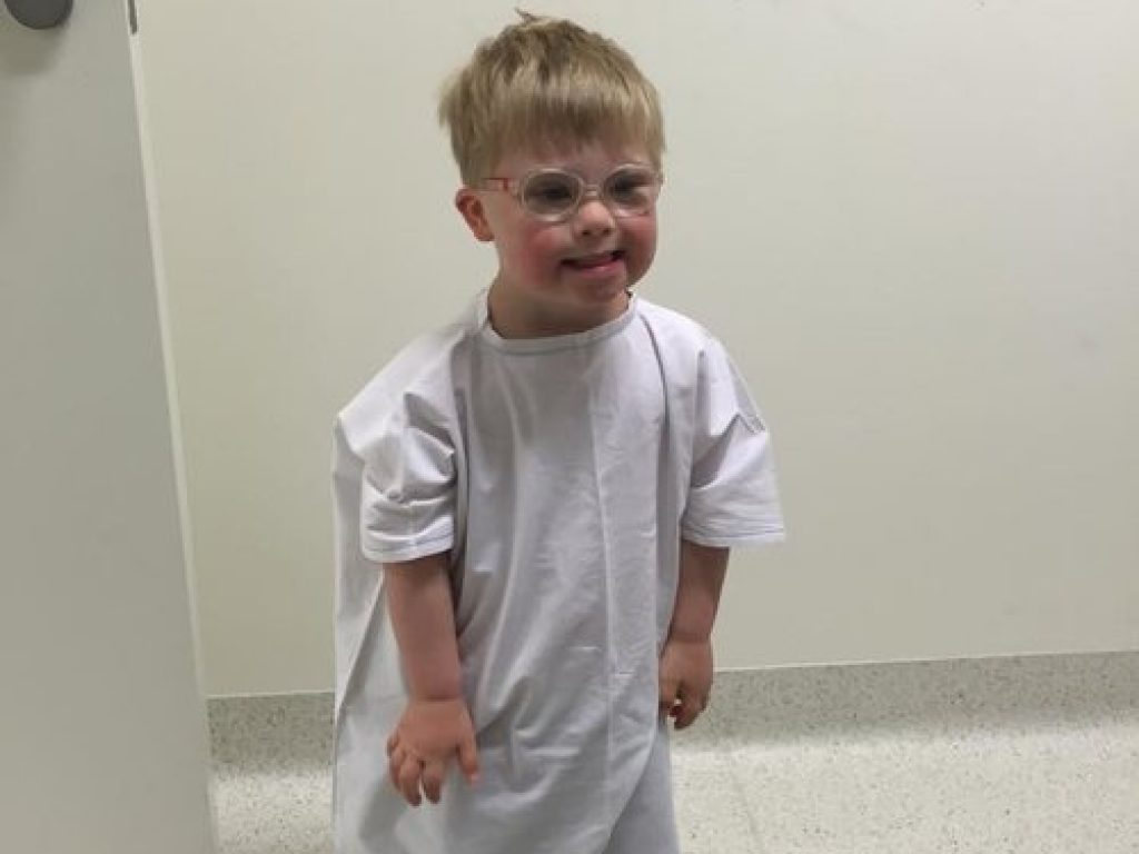 Boy in medical gown
